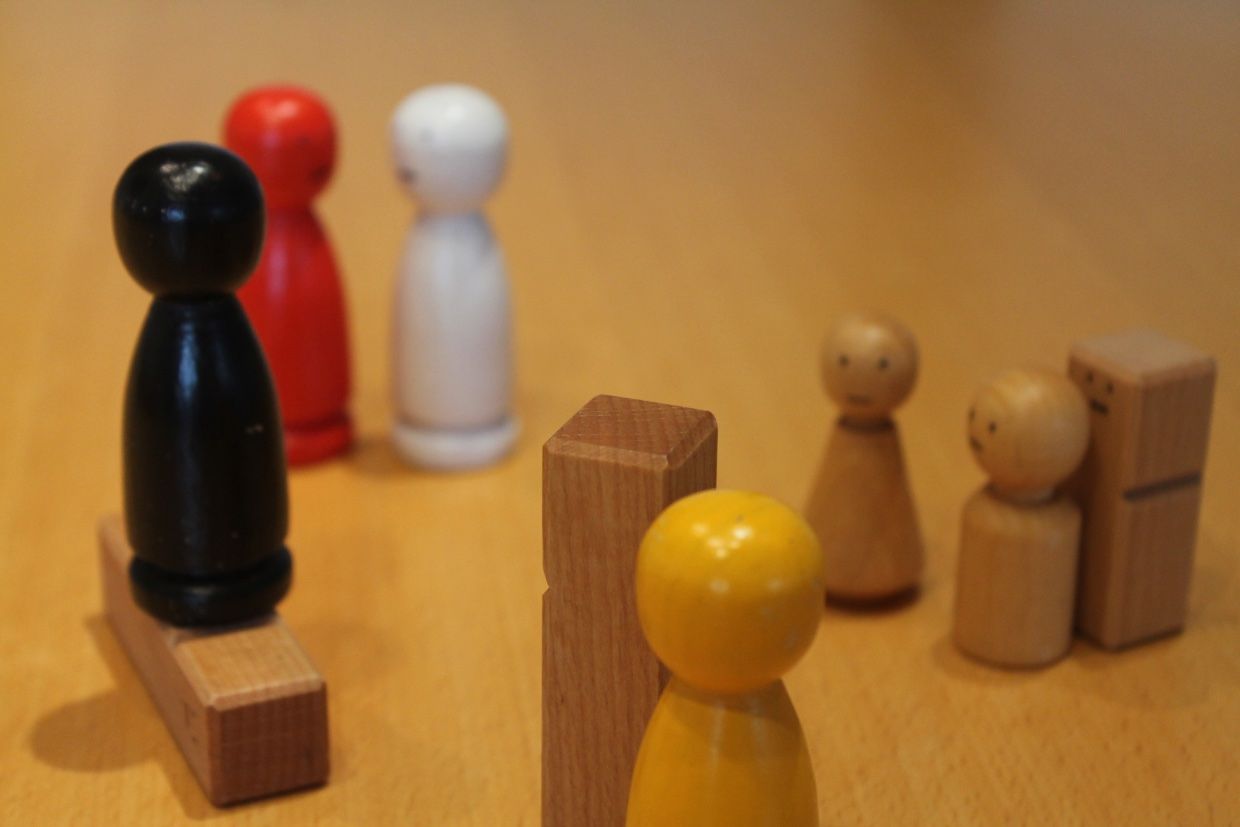 Systemische Therapie mit Holzfiguren